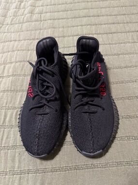 Adidas Yeezy Boosts Black Knit Low-Top Sneakers with Red Side Accents